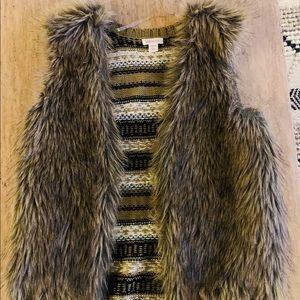 Knitted back brown fur vest.